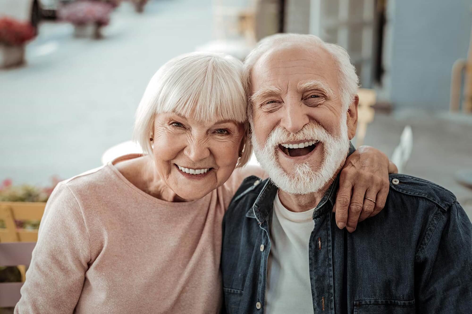 Happy elderly couple enjoying independent living with home care support in Luton
